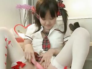 Cute Asian Schoolgirl Joyfully Vibrates Her Pussy